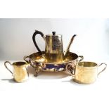 A three piece silver plated coffee service;