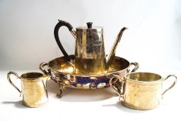 A three piece silver plated coffee service;