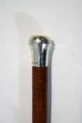 A slim malacca cane with silver knop (London 1879)