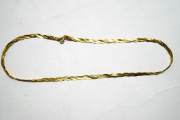 A 9 carat gold necklace, of plaited S links, 40.5 cm long, 5.