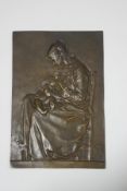 A late 19th century French bronze plaque, "Maternite",of a lady breastfeeding her baby, stamped A.L.