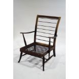An Ercol 1956 beech armchair frame,