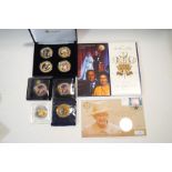 Eleven various Royal commemorative coins, mostly Queen Elizabeth and Prince Phillip,