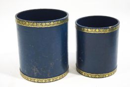 A blue leather waste paper bin, with gilt tooled decoration and a smaller matching example,