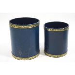 A blue leather waste paper bin, with gilt tooled decoration and a smaller matching example,