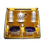 A late Victorian five piece silver condiment set, maker T.W.