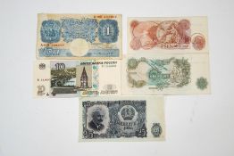 An English blue one pound banknote, a green one pound banknote,