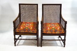 A pair of 19th century bergere armchairs with cane seats and backs