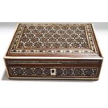 An Islamic rosewood box, inlaid with bone and white metal, with repeating geometric design,