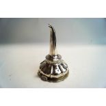 A Georgian silver wine funnel, indistinctly marked for London, with applied crested cartouche,