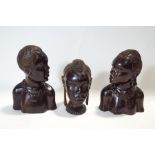 Three Nigerian carved tribal heads,