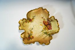 A Royal Worcester Blush Ivory leaf shaped dish, decorated with flower sprays, printed factory marks,