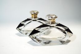 A pair of Art Deco perfume bottles with silver tops, makers mark William Adams, 1920/21, Birmingham,