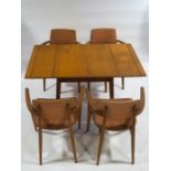An Imperial 1960's dining table and a set of four chairs (sold as a collector's item only)