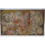 A large contemporary multi-media picture of fossils on board, paper, sand and paint,