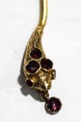A garnet set serpent necklace, in the Victorian style, unmarked, 44cm long, 20.