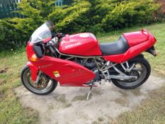A 1997 Ducati Supersport 600 Desmo, registration number R536 KFW, red.