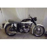 A 1960 Norton Dominator Model 99, registration YRK 260, chassis number R14/92193, black and cream.