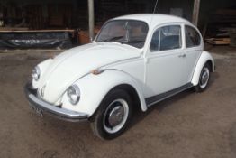 A 1969 VW Beetle 1300 Automatic, registration MPV 714G, chassis number 11-9980144, white.