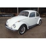 A 1969 VW Beetle 1300 Automatic, registration MPV 714G, chassis number 11-9980144, white.