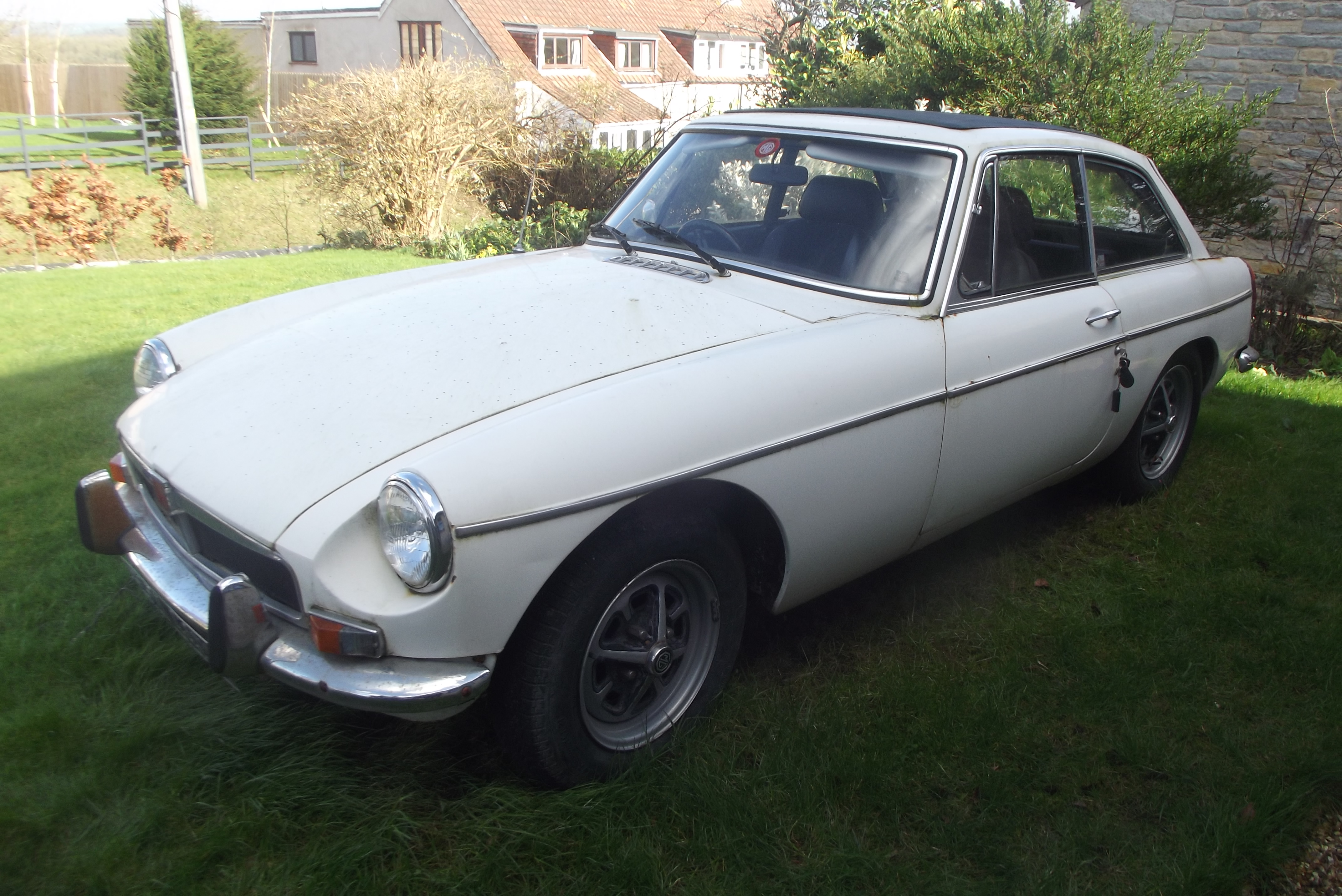 A 1971 MGBGT, registration number EHY 440K, chassis number GHD-5267324G, white.