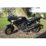 A 1998 Triumph Trident Sprint Sport 900, registration R421 TEG, black.