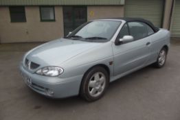 A 2000 Renault Megan 1600 Sport Convertible, registration number W691 SPW, silver.