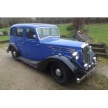 A 1939 Wolseley 14/60, registration FSU 786, blue over black.