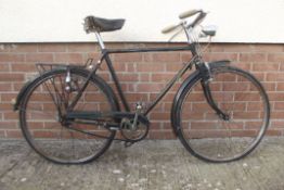 A 1952 Triumph Bicycle, green.