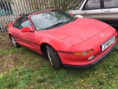 A 1992 Toyota MR2 T-Bar, registration number J748 EYD, red. A project car for recommissioning.