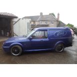 A 1989 Ford Escort Mk.4 Van Custom, registration G213 XLX, blue.