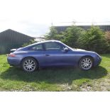 A 1999 Porsche 911 Carrera Tiptronic S, registration number PCZ 1469,