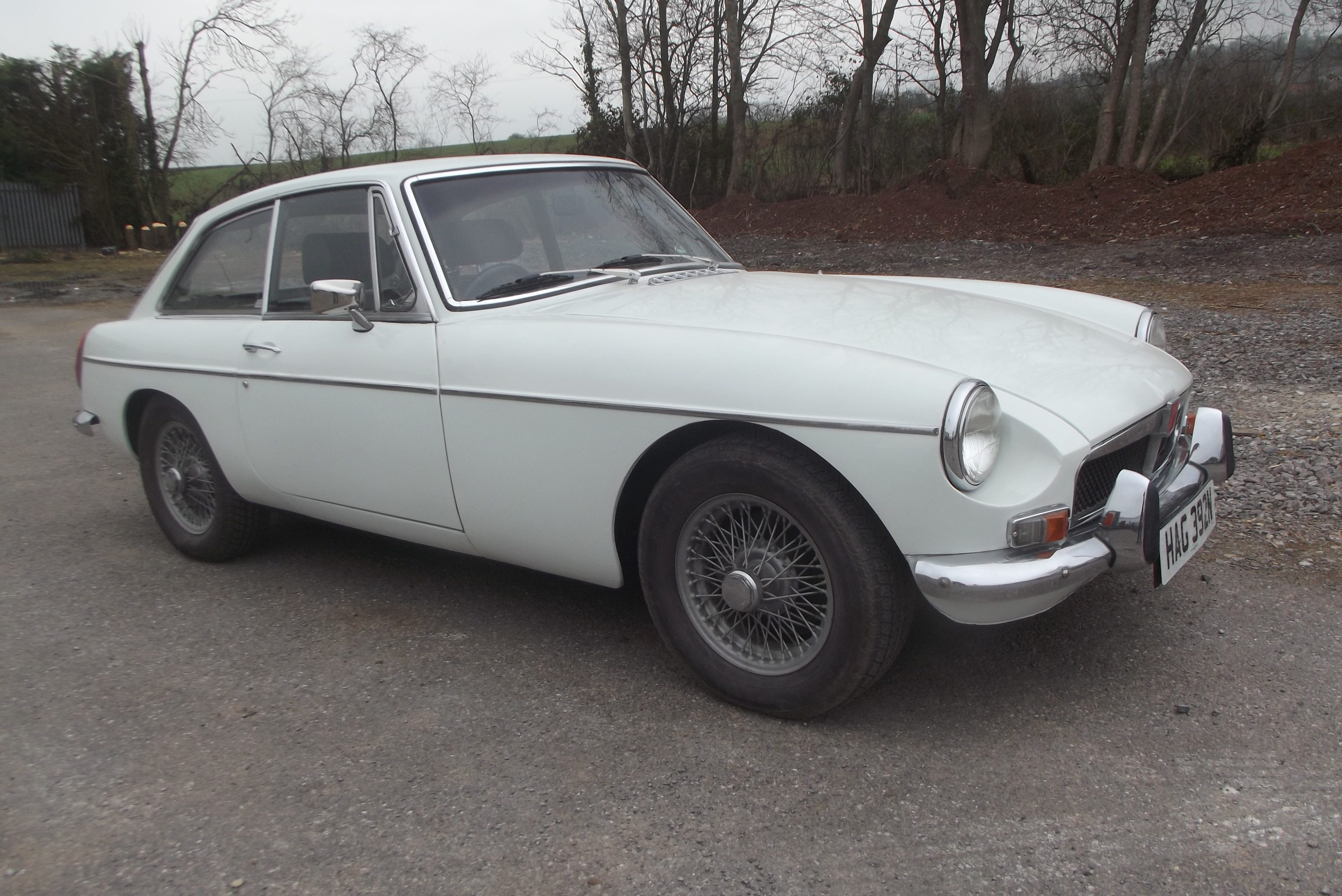 A 1975 MGBGT, registration HAG 393N, chassis number GHD5-359580G, white.