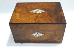 A Victorian burr walnut and mother of pearl inlaid vanity box,