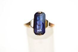 A synthetic blue sapphire set ring, unmarked, finger size Q, 2.