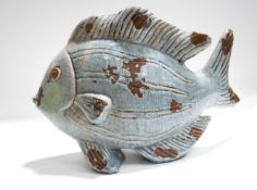 A Studio pottery figure of a carp fish with unusual pale blue crackle glaze,