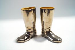 A pair of silver plated wellington boots salts with plastic liners, 8.