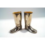 A pair of silver plated wellington boots salts with plastic liners, 8.
