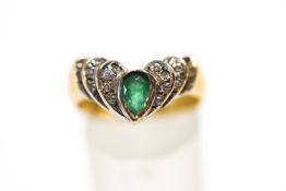 An emerald and diamond ring, unmarked,