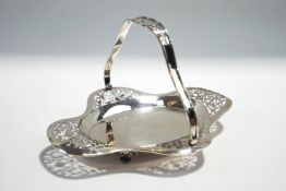 A silver swing handled shallow basket, Birmingham 1910,