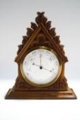 A Victorian oak cased desk barometer,