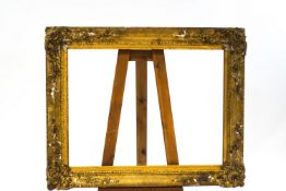 A Victorian gilded wood and gesso frame to take picture 94cm x 71cm