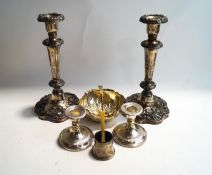 A pair of electroplated desk candlesticks; a pair of Sheffield Plate candlesticks;