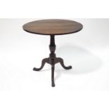 A 19th century and later mahogany tripod table with snap top,