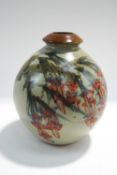 An Eeles Family pottery vase of globular form painted with flowers, impressed mark to base,