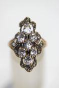 A 9 carat gold white sapphire elaborate cluster ring, finger size Q1/2.