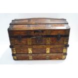 A 19th century metal bound travelling trunk, with interior shelf,