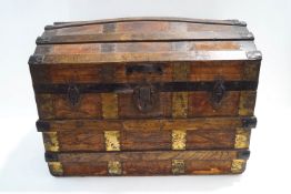 A 19th century metal bound travelling trunk, with interior shelf,