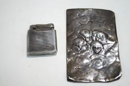 A Colibri hallmarked silver lighter,