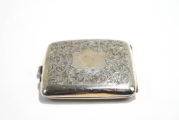 A silver engraved cigarette case, 97 g (3.